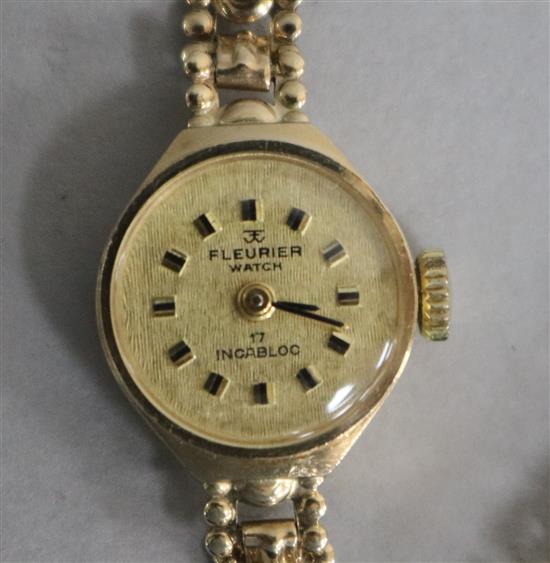 A ladys 9ct gold Fleurier manual wind wrist watch, on a 9ct gold fancy link bracelet.